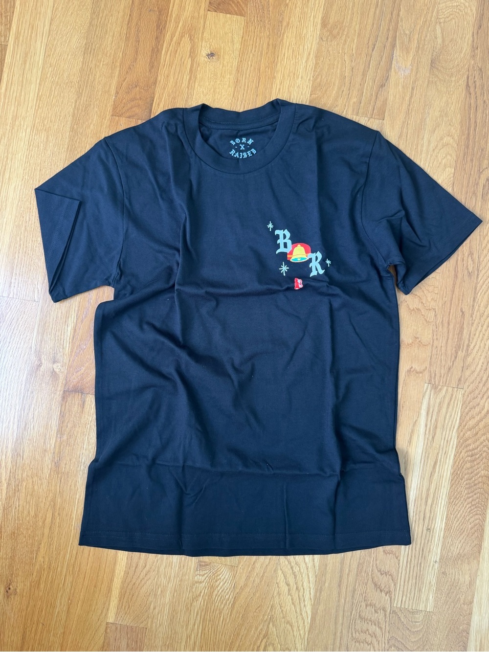 Taco Bell BORN X RAISED Black Short Sleeve Tee with Small Color Logo